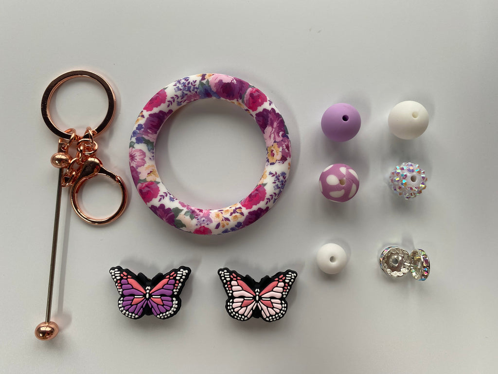 Focal*2, Silicone ring*1, Key stick*1, Silicone beads15mm*10pcs, Printed beads15mm*2pcs, Fancy beads14mm*2pcs, Spacers12mm*6pcs, Lentils12mm*10pcs.sed to make pens, bracelets, lanyards, necklaces, keychains, school bag pendants, friendship gifts and other crafts.